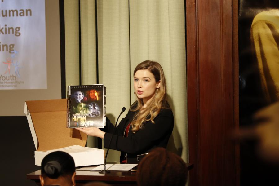 Erica Rodgers presenting Youth for Human Rights International’s free Educators Package and explaining the role human rights education plays in combating trafficking.