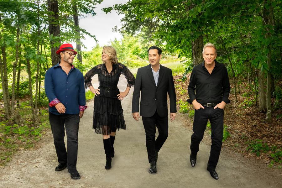 Image of FLOW walking in Vermont countryside: their new album PROMISE is available today.