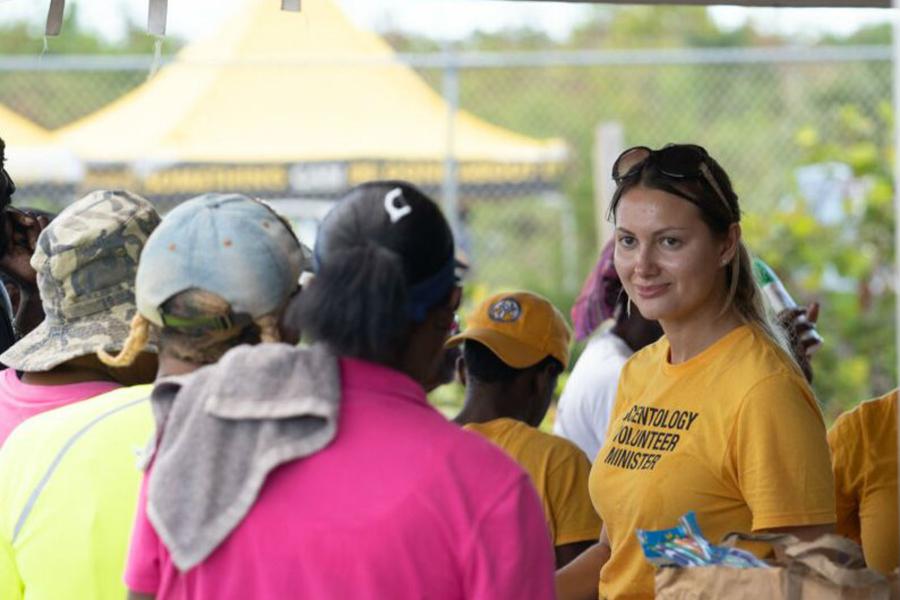Once again this weekend, a team of Scientology Volunteer Ministers (VMs) manned the supply lines to ensure the people of Grand Bahama Island received the help they need
To distribute the aid pouring in to the island, Bahamas Senator Kay Forbes Smith worked out a simple way to get supplies out of the warehouse and into people’s hands
“We started by 5:30 a.m.,” said Kirstie, one of the Volunteer Ministers who’s been in the Bahamas since the disaster struck
For two days leading up to Relief Days, Kirstie and her team organized supplies for distribution, but within the first two hours, they started running short
A team of emergency room doctors who flew in from Florida came to the Volunteer Ministers tent and asked if they could set up there to run a medical station
“The manager of the warehouse was beyond thrilled,” says Kirstie
The only downside was the service was so popular, people were having to wait in line in the sweltering heat
Some 600 people are still reported missing in the aftermath of Hurricane Dorian, Prime Minister Hubert Minnis announced last week to the United Nations General Assembly
The Scientology Bahamas Disaster Response continues to serve, while training local residents in the technology they use
Scientology Churches in Florida have organized teams of volunteers who are unable to contribute their services full time, but who can travel to Freeport each weekend to provide additional resources to the main body of Volunteer Ministers on the ground
Anyone who can help should contact their local Church of Scientology or International Volunteer Ministers Headquarters at (800) Help-4YU
The Church of Scientology Volunteer Minister program is a religious social service created in the mid-1970s by L
Watch films based on the tools of the Volunteer Minister on the Scientology Network
For more information, follow the Scientology Newsroom Scientology Volunteer Ministers tent at Disaster Days in Freeport