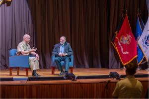 U.S. Navy Adm. Frank “Mitch” Bradley, commander, U.S. Special Operations Command (USSOCOM) answers student questions in talk facilitated by Professor Emeritus John Arquilla at the Naval Postgraduate School (NPS), Nov. 18, 2025.