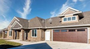 Townhome residences in Siesta Hills with large garage structures, reflecting homeowner demand for versatile storage in HOA communities.