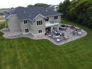 Siesta Hills single-family residences on sizable lots, built with tall, roomy garages intended for larger vehicles, recreational gear, and indoor storage.