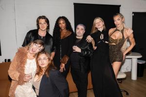 Celebrities posing together at The Brittprint x JPPR launch party.