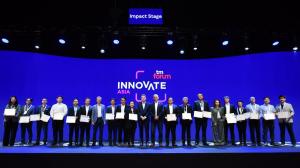 Award ceremony on stage at Innovate Asia