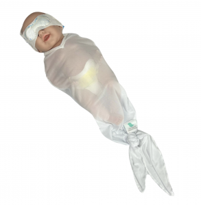 infant wearing translucent swaddle and phototherapy eye protection