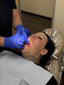 Woman in surgery getting a full arch treatment