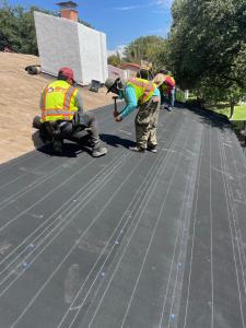 JM roofers working