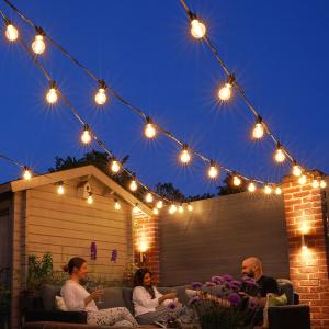 Cozy outdoor patio with warm festoon lights.