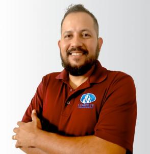 Ruben Mendosa founder smiling with DFM concrete Shirt