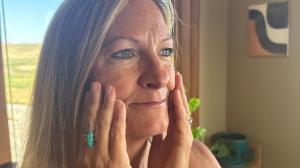 Owner of Sego Lily Skincare, Holly Stoltz, enjoys the amazing feeling of her tallow butter made with 100% natural plant-based fragrances.