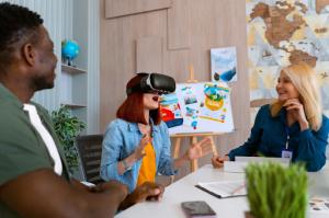Group of learners participating in a personal development exercise with a VR headset, illustrating interactive and modern self-improvement training methods.