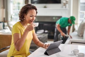 eco valley employee cleaning a sofa