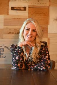 Lindsay Smith, author of Always Wear Gold and founder of Amplify Experiences.