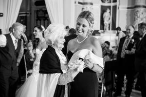 Lindsay Smith dancing with her grandmother Baba at a family celebration, a moment that reflects the connection and legacy behind the book Always Wear Gold.