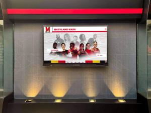 University of Maryland’s “Maryland Made” interactive digital display showcasing diverse alumni and current student athletes, emphasizing athletic and professional success.