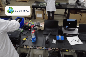 Worker testing laptops