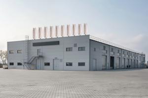 Row of wind turbines on roof