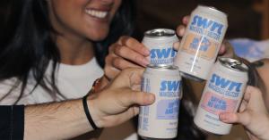 People enjoying SWRL's 4 cans