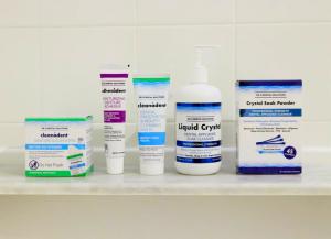 Full denture care system with denture and white background