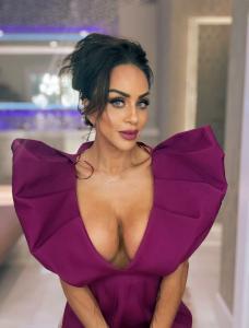 Maria Cozamanis on set in Palm Beach, highlighting her signature glam and bold presence as seen in Netflix’s Members Only: Palm Beach.