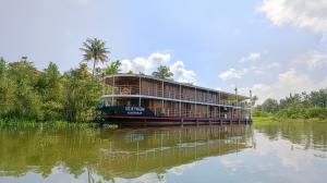 RV Kochi Pandaw sailing through the Kerala Backwaters