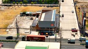 A rooftop solar power system installed by Solaren at a J.CO Donuts facility, showing photovoltaic panels across the commercial building.
