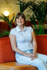 Ashlyn Fischer, Host of Currently Screaming with Ashlyn Podcast