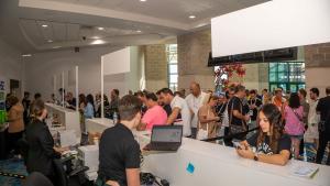 Attendees arriving at registration