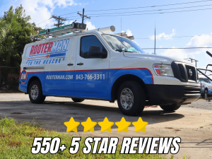 Rooter Man Charleston service van parked outdoors with a milestone graphic celebrating 550-plus five-star reviews.