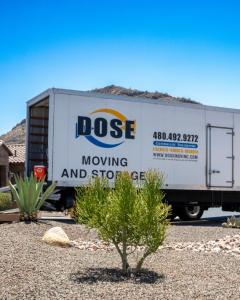 Dose Moving and Storage truck in Phoenix Arizona desert landscape providing Valley moving services