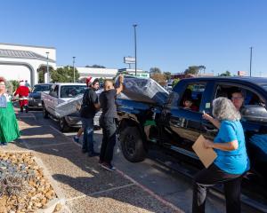 Families-in-Need-Arriving-At-Miracle-Mattress-For-a-Free-Mattress-in-San-Antonio