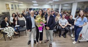 Celebrating a milestone: Loriane Maeda is honored by her Brazilian colleagues as she transitions from Managing Director Brazil to a global leadership role in the U.S.