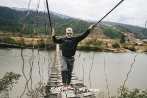 Stephan Muller crosses one of many suspended bridges on the route