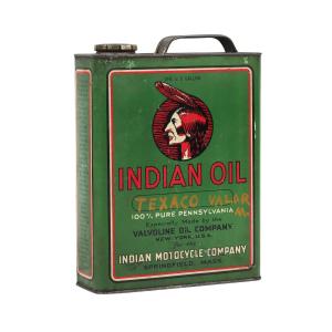 American 1920s lithographed tin Indian Oil can, featuring the early style Indian Motorcycle logo, showing a stylized Native American head adorned with a single feather (CA$10,030).