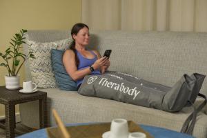 A photo of the Therabody RecoveryAir Compression system