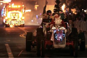 Front view of our 1939 Ford 9N tractor pulling our Russian River Railbikes Float