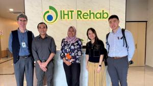 Robotimize team with Rebejac Bruno and Dr. Nor Azira Ismail at IHT Rehabilitation Centre Kuala Lumpur discussing NEUROLITH TPS technology