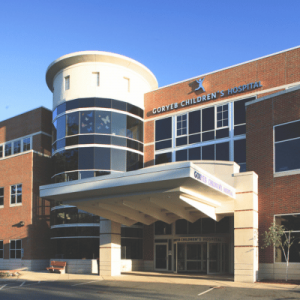 Exterior view of Goryeb Children's Hospital featuring a modern design, large windows, and a welcoming entrance.