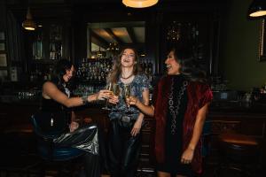 Woman enjoying new years eve at the stella hotel