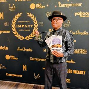 Celebrating International Impact Book Awards recognition for “Bobby Joe the Criminal.”