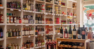 Interior of Burden of Proof in South Pasadena showing shelves stocked with non-alcoholic wines, spirits, beers, and ready-to-drink beverages arranged by category.