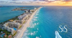 Cancun Peninsula Shot From High Above Showing Blue Water and White Sand Beaches Before Sunset