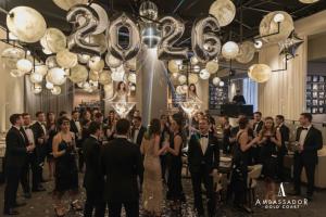 Expect flapper-chic energy, speakeasy vibes, and a venue transformed into a world of timeless decadence.