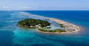 Aerial view of a small island attached to the barrier reef.