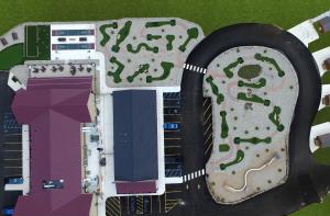 Artist ariel view rendering of AGS mini golf and game courts at Alpen Bluffs Resort in Grayling, MI