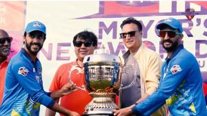 Mayor’s New World T20 trophy presentation organized by Pramanit Global Ventures USA Inc. (PGV), with league commissioner Brijesh Mathur and championship players in Lauderhill, Florida.