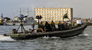 Aboard a Dutch Navy SOF fast raiding, interception, and special forces craft (FRISC) during the BOMA exercise, the Naval Postgraduate School c-UAS team deployed multiple sensors mounted to masts for detecting and identifying drone threats.