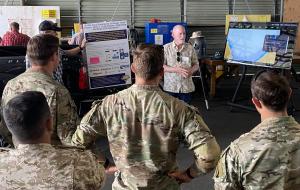 Over 80 officer-scholars from Naval Postgraduate School visited its quarterly Joint Interagency Field Experimentation (JIFX) exercise as observers. Here, officer-scholars received a briefing on the new NPS c-UAS system being tested at JIFX prior to the BOMA exercise.