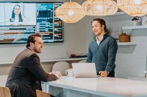 Real estate agent inspecting home renovation potential.