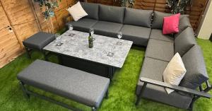 Aluminium garden furniture corner dining set by Garden Furniture Hub Essex, featuring modern garden furniture design with rope garden furniture styling for outdoor living.